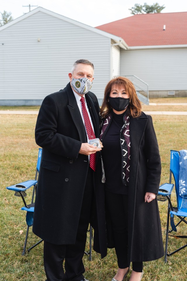 Walter Haag, a 37-year Army Reserves veteran, poses for a photo with his wife, Evelyn Haag, Dec. 17, 2020, at Fort McCoy, Wis.  Haag received numerous commemorative coins from the battalions of the 181st Multifunctional Training Brigade along with...