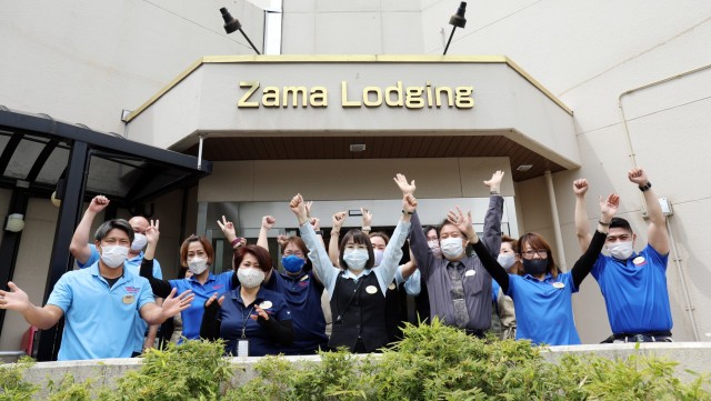Camp Zama Army Lodging employees celebrate winning the fiscal 2020 Lodging Operation of the Year Award for the medium category at Camp Zama, Japan, April 28.