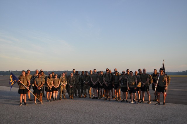 Staff Weather Officers with the 18th Combat Weather Squadron, Tactical Air Control party Airmen from the 15th Air Support Operations Squadron and Grey Eagle Soldiers from the 3rd Combat Aviation Brigade participated in Tuesday’s 4.75 mile ruck...