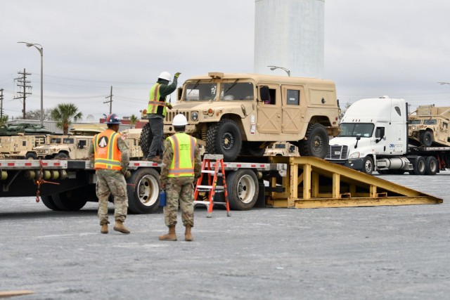 Surface Warriors from the 842nd Transportation Battalion and their stevedore partners receive and offload vehicles outside the Port of Port Arthur, Texas. As Single Port Manager, the Military Surface Deployment and Distribution Command’s units...