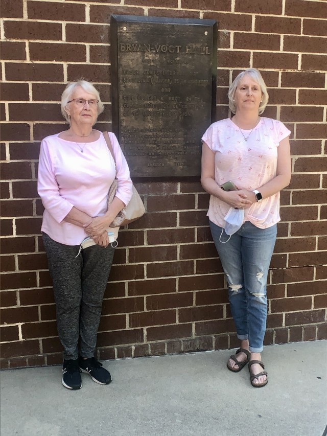 Gold Star Spouse Nancy Jacobs and daughter Kristy Drews pose next to the memorial plaque placed outside Bryan-Vogt Hall, April 22 on Fort Stewart. The building was erected and dedicated in 1979 in honor of Jacobs’ late husband, Chief Warrant...