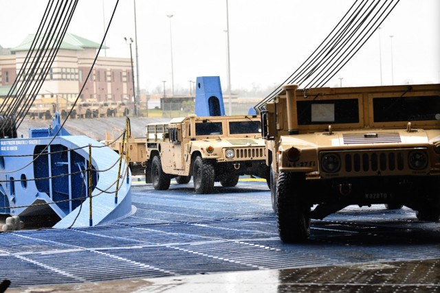 Stevedores at the Port of Beaumont drive military vehicles onto the M/V Resolve February 20, 2020 in support of DEFENDER-Europe 20. DEFENDER-Europe 20 was the first in a series of exercises the U.S. Army has planned in Europe and the Pacific over...