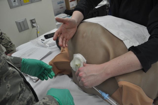 Martin Army Community Hospital's graudating residents practiced inserting a chest tube as part of the FMRx, a 3-day operational medicine course.