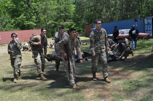 Doctors from Martin Army Community Hospital's Family Medicine Residency Program evacuated a casualty during an exercise at the Medical Simulation Training Center as part of their 3-day operational medicine course, Family Medicine Residency...