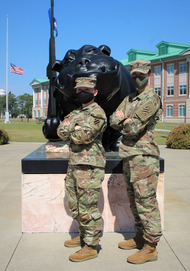 U.S Army 1st Lt. Trisha Burden and 2nd Lt. Amanda Atkinson both assigned to 9th Brigade Engineer Battalion, 2nd Armored Brigade Combat Team, 3rd Infantry Division, pose for a photo on Fort Stewart, Georgia, April 7, 2021. They will compete in 14th...
