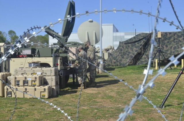 Specialists Cody Stutz and Manuel Heredia, both assigned to 21st Brigade Engineer Battalion, 3rd Brigade Combat Team, 101st Airborne Division (Air Assault), take part in training using LVC-IA version 4.0 April 15 outside the Lt. Gen. Harry W.O....