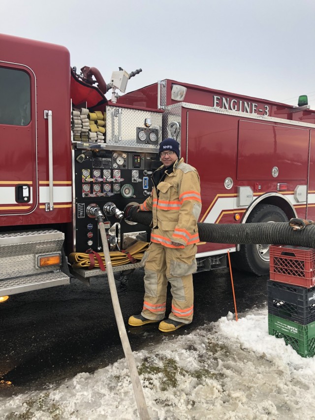 Mark Colley, a volunteer firefighter with the New Haven, Mich. Fire Department, supervises Conduction Pump Operations following a house explosion in Dec. 2018.  Luckily there were no injuries in the incident. (Courtesy Photo)