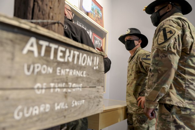 Colonel Ryan Hanson, commander 1st Armored Brigade Combat Team and Command Sergeant Major Calvin Hall, command sergeant major 1st Armored Brigade Combat Team tour Muzeum Obozow Jenieckich Prisoner of War Camps Museum, Stalag Luft III during the...
