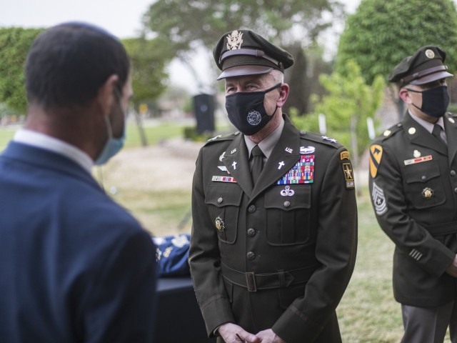 Chaplain (Maj. Gen.) Thomas Solhjem, the U.S. Army Chief of Chaplains, speaks with guests during the Torah scroll dedication ceremony at Fort Bliss, Texas, April 26, 2021.