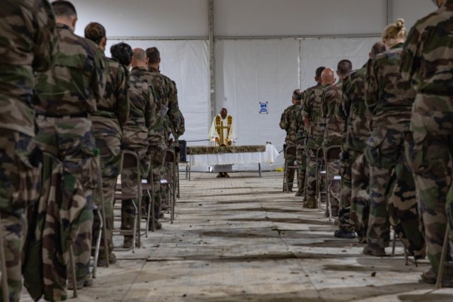 French Soldiers join together in prayer during a French-language Easter mass at Fort Hood, Texas, April 4, 2021. The date of Easter changes every year, falling on the first Sunday after the first full moon on or after the spring equinox. (U.S....