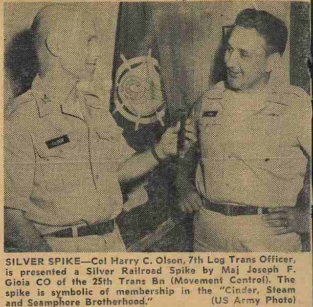 A historic photo with an estimated date of August 13, 1962, depicting the presentation of the Silver Spike Award from Maj. Joseph Gioia to Col. Harry Olson. The award has been a mainstay at the battalion, but was not presented since 2013 until it...