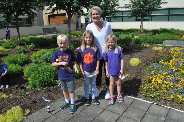 Martin Army Community Hospital celebrates Month of the Military Child by having our youngest heroes plant purple flowers.