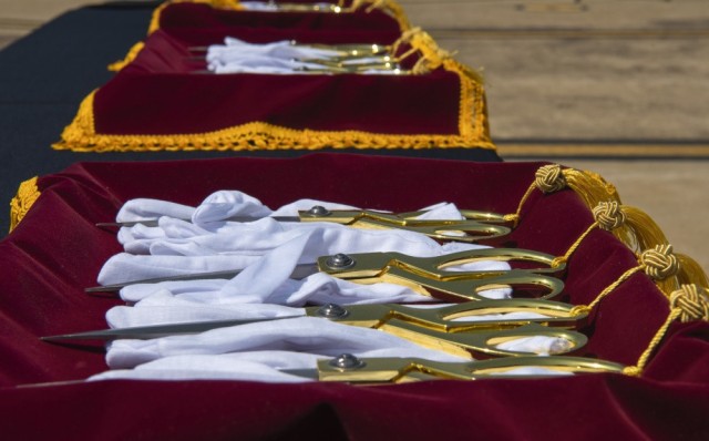Scissors and gloves are placed for a ribbon cutting ceremony revealing new renovations accomplished at Osan Air Base, Republic of Korea, May 3, 2021. Osan senior leaders and key members will cut a ceremonial ribbon marking the opening of a new...