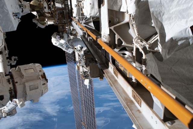 Col. Andrew Morgan, NASA astronaut and Army flight surgeon, is tethered to the Starboard-3 truss segment worksite during the second spacewalk to repair the International Space Station&#39;s cosmic particle detector, the Alpha Magnetic Spectrometer. 