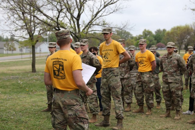 WICHITA, Kan. – Cadets of the Wichita State University Army Reserve Officer Training Corps listen to instructions and a safety briefing before starting out on their park clean-up community service project at Glen Dey Park April 28. Cadre of WSU...