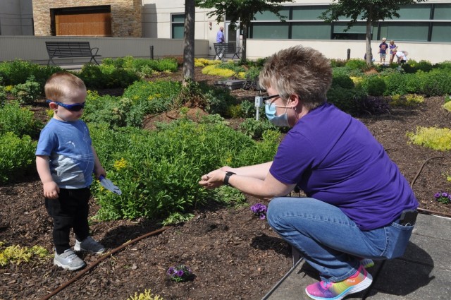 Martin Army Community Hospital celebrates Month of the Military Child by having our youngest heroes plant purple flowers.
