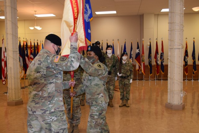 Command Sgt. Maj. Tisa W. Scott relinquishes responsibility as the US Army Garrison Rock Island Arsenal command sergeant major by virtue of passing the unit colors to Col. Todd Allison, garrison commander, US Army Garrison Rock Island Arsenal, at...