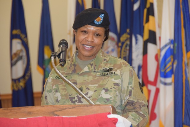 Command Sgt. Maj. Tisa W. Scott gives remarks at the relinquishment of responsibility ceremony held in Heritage Hall at Rock Island Arsenal on April 30.