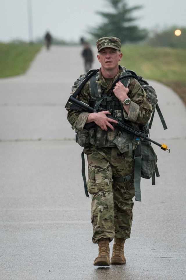 Air Force Tech. Sgt. Darren Ruth, 368th Training Squadron, competes in the 12-mile ruck march event April 28. Ruth was named MSCoE Joint Service NCO of the Year.