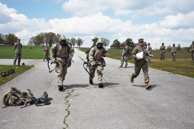 Competitors move as quickly as possible between stations during The Crucible event April 29 near Baker Theater. The event included many standards and soldiering skills from the Expert Soldier Badge certification.
