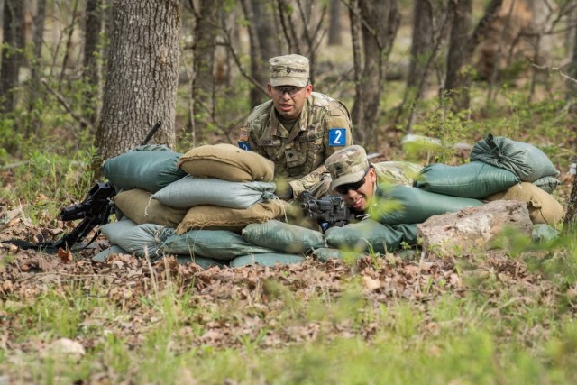 Staff Sgt. Christopher Aquirre (right) and Spc. Daneil Limon, representing 68th Chemical Company, engage a simulated enemy April 27 at Training Area 125.