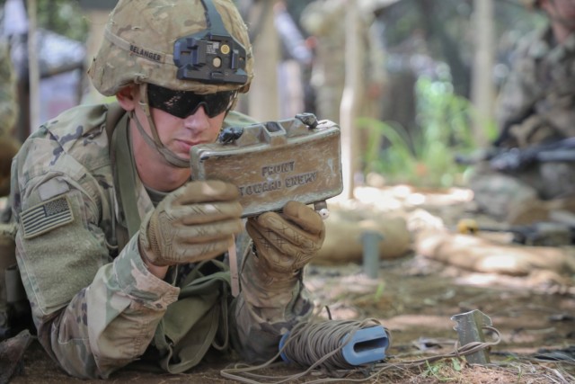 Pfc. Owen Belanger, Company C, 1st Battalion, 21st Infantry Regiment, 25th Infantry Division, practices deploying and retaining a dummy M18A1 claymore on Schofield Barracks, Hawaii, April 27, 2021, for the Expert Soldier Badge/Expert Infantry Badge competition. The EIB/ESB is reserved for Soldiers possessing military occupational specialties of infantryman or special forces, while the Expert Soldier Badge is open to the remainder of Soldiers aside from medics and it tests Soldiers’ abilities on basic soldiering skills in an intense competition.