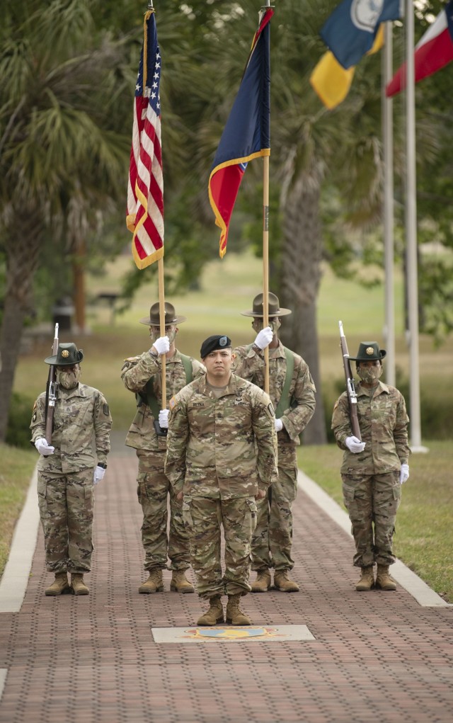 Sgt. Maj. Michael Reyna, 193rd Infantry Brigade operations sergeant major and commander of troops, leads the unit honor guard during the brigades change of responsibility ceremony May 3 at Victory Field. During the ceremony Command Sgt. Maj....