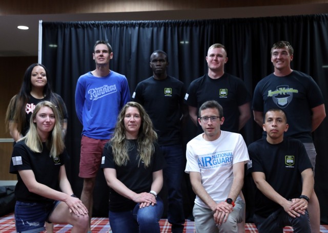 Lincoln, Neb. - The 2021 Kansas National Guard Marathon Team poses for a picture at the Lincoln Marathon in Lincoln, Nebraska May 2, 2021. (Left to right back row): Staff Sgt. Lisa Tillman, 190th Air Refueling Wing, Kansas Air National Guard;...