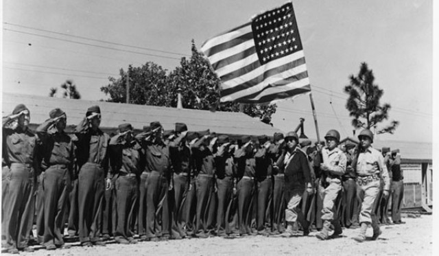 The U.S. Army 442nd Regimental Combat Team stands in formation at Camp Shelby, Miss., June 1943.