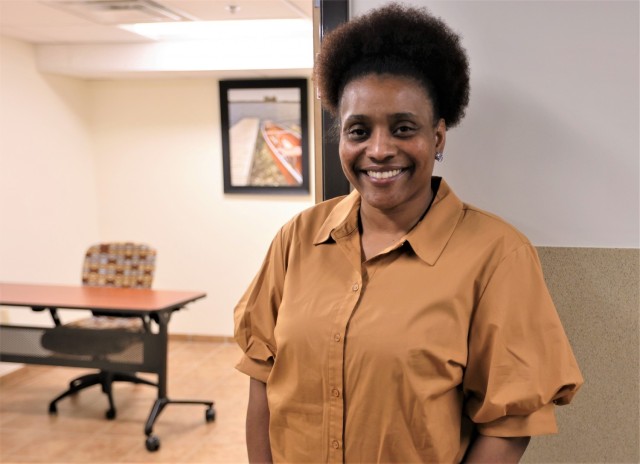 New ACS specialist Summer Carney stands outside of one of the Fort Knox coworking spaces available to Spouses.