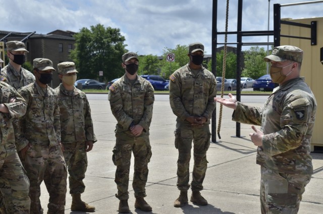 Staff Sergeant Noah Cole assigned to 2nd Battalion, 502nd Infantry Regiment, 2nd Brigade Combat Team, 101st Airborne Division (Air Assault), talks about his personal COVID-19 experience May 3 with other 2-502nd Soldiers.