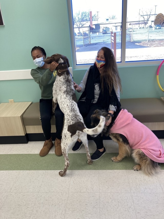Sgt. Tekeyah Purvis (left) and Spc. Angel Africa (right) volunteered at a new pet care facility at Fort Belvoir, Va., on Jan. 28, 2021. Soldiers assigned to the Fort Belvoir Soldier Recovery Unit assist with tasks, such as grooming, training and...
