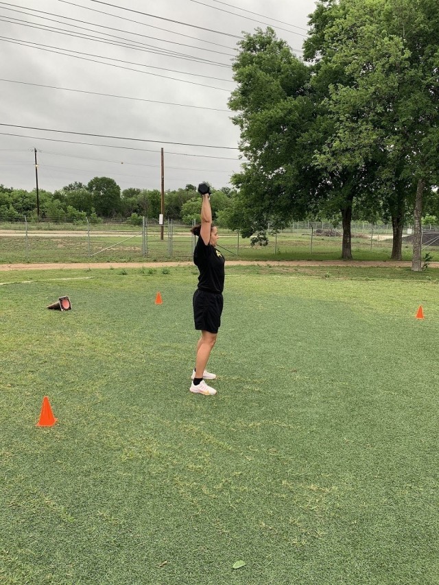 Staff Sgt. Brittany Payne, a Soldier assigned to the Joint Base San Antonio Fort Sam Houston Soldier Recovery Unit, Texas, participated in a high intensity interval training session at Liberty Field on April 30, 2021. (Photo courtesy of Erik Holderby)