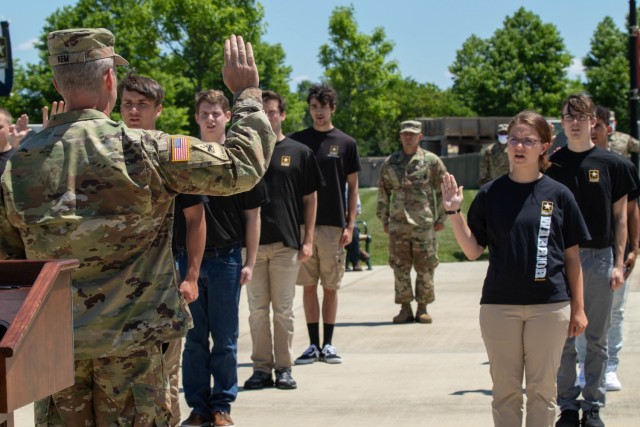 Maj. Gen. John S. Kem, U.S. Army War College commandant, delivers the oath of enlistment to 25 future Soldiers in a ceremony at the U.S. Army Heritage and Education Center in Carlisle, Penn., June 12, 2020.