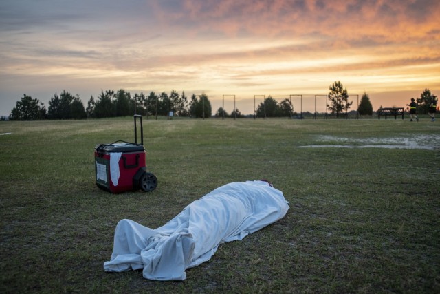 Equipment and a notional casualty are set up for the heat casualty drill at the Noncommissioned Officer Academy's physical training site April 28.