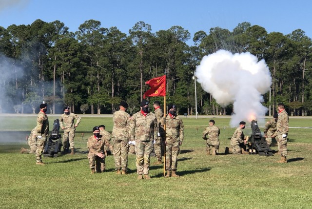 U.S. Soldiers assigned to the Salute Battery of Bravo Battery, 1st Battalion, 9th Field Artillery Regiment, 2nd Armored Brigade Combat Team, 3rd Infantry Division conduct honors during the promotion ceremony of Maj. Gen. Hubert Cottereau on May 7,...