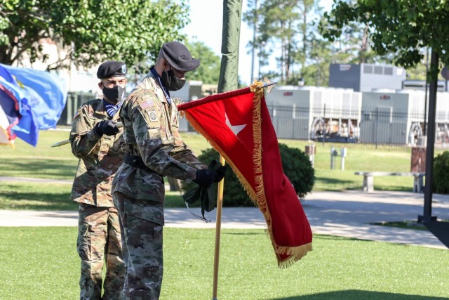 U.S. Army 3rd Infantry Division Soldiers uncase a two-star flag during French Army Maj. Gen. Hubert Cottereau’s promotion ceremony to signify the deputy commanding general’s increased authority and responsibility May 7, 2021, at Marne Garden...