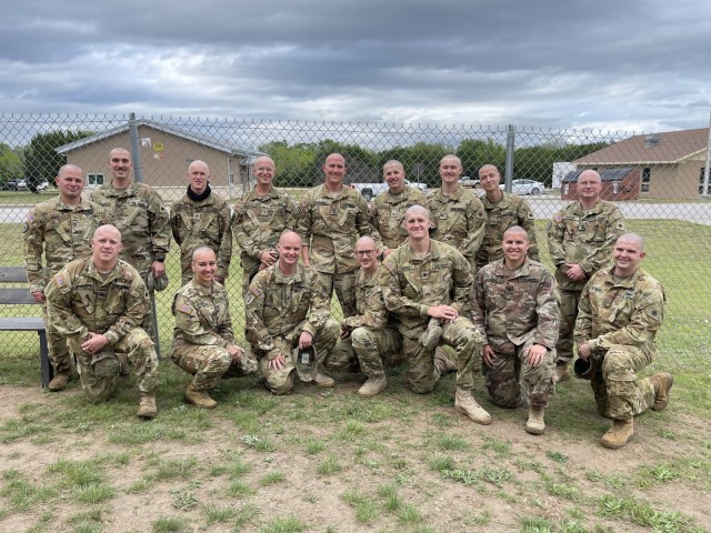 Soldiers from 1st Battalion, 171st Aviation Regiment (General Support Aviation Battalion) shaved their heads and posed for a picture at North Fort Hood, Texas, before deploying to the Middle East with Task Force Phoenix. They shaved their heads in...
