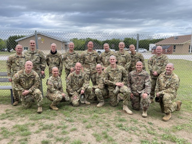 Soldiers from 1st Battalion, 171st Aviation Regiment (General Support Aviation Battalion) shaved their heads and posed for a picture at North Fort Hood, Texas, before deploying to the Middle East with Task Force Phoenix. They shaved their heads in support of Staff Sgt. Brandon Stafford&#39;s sister, who was going through chemotherapy and radiation treatment after having a brain tumor removed.  