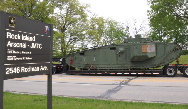 The historic Liberty Mark VIII tank, manufactured at Rock Island Arsenal 101 years ago in support of World War I, makes it way home through the streets of Moline, Illinois. The tank is only one of three left in existence. – Photo by Staci-Jill...