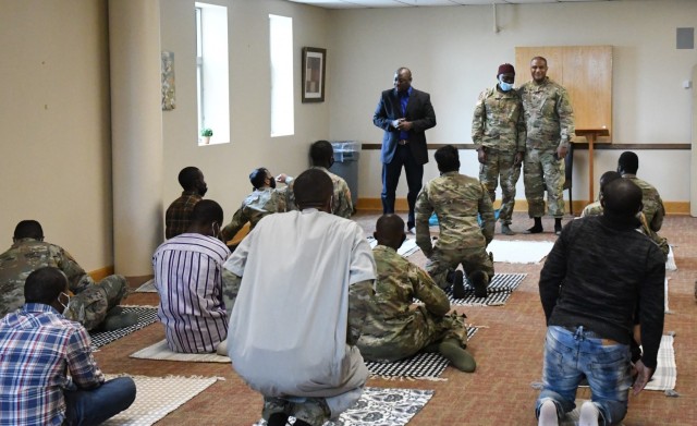 Chaplain (Col.) Khallid Shabazz, U.S. Army Central Command chaplain, leads the Jum’ah Prayer 
Service at Main Post Chapel on May 7, during his visit to Fort Drum. The Religious Support Office began offering the new service only weeks ago, and it has grown in attendance each Friday. (Photo by Mike Strasser, Fort Drum Garrison Public Affairs)