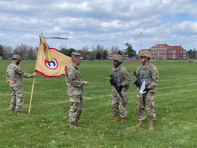Command Sgt. Maj. Michael Perry, 1st Theater Sustainment Command’s senior enlisted advisor, congratulates Spc. James Spoerl, human resources specialist, 1st Theater Sustainment Command, and Staff Sergeant Nahjier Williams, public affairs noncommissioned officer, 1st TSC, following the Best Warrior Competition ceremony at Fort Knox, Kentucky, April 1, 2021. The Best Warrior Competition recognizes Soldiers who demonstrate commitment to the Army values, embody the Warrior Ethos, and represent the Force of the Future. (U.S. Army photo by Staff Sgt. Godot G. Galgano, 1st TSC Public Affairs)