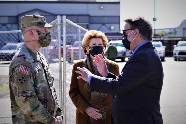 Maj. Gen. Darren Werner, Tank-automotive and Armaments Command and Detroit Arsenal Senior Commander, meets briefly with U.S. Senators Gary Peters and Debbie Stabenow prior to a groundbreaking ceremony for a Detroit Arsenal electrical substation May 10.