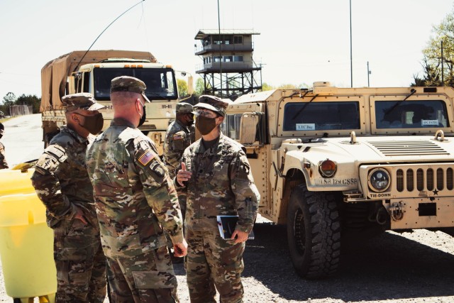 Lt. Col. Shelia Day (right), commander, Command Sgt. Maj. Larry Jarrett (left), senior enlisted advisor, and Maj.  Dewey Courtney (middle), executive officer, all assigned to 129th Combat Sustainment Support Battalion, 101st Division Sustainment...