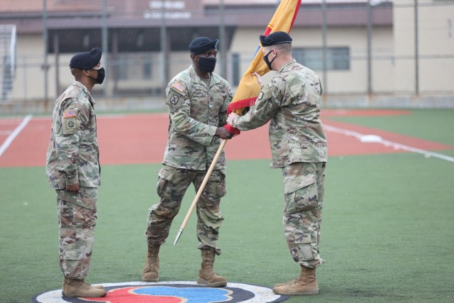 Brig. Gen. Steven Allen, commander, 19th Expeditionary Sustainment Command, receives the command colors from Command Sgt. Maj. LaDerek Green, command sergeant major, 19th ESC, during a relinquishment of responsibility ceremony on Camp Walker,...