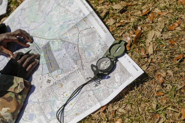 A compass sits on a map during the land navigation portion of the 3rd Infantry Division’s Soldier and Noncommissioned Officer of the Year Competition on Hunter Army Airfield, Georgia, May 6, 2021. Candidates must outperform all other competitors in both physical and mental toughness as well as technical and tactical knowledge and proficiency to proceed through the corps, major command, and ultimately the Army level competitions. (U.S. Army photo by Spc. Savannah Roy/ 3rd Combat Aviation Brigade, 3rd Infantry Division)