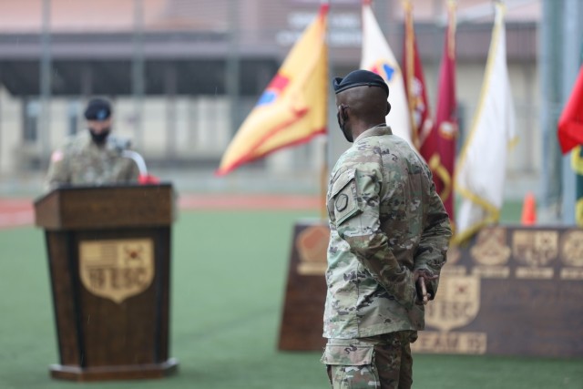 Command Sgt. Maj. LaDerek Green, Command Sergeant Major, 19th Expeditionary Sustainment Command, listens as Brig. Gen. Steven Allen, commander, 19th ESC, delivers closing remarks during a relinquishment of responsibility ceremony on Camp Walker,...
