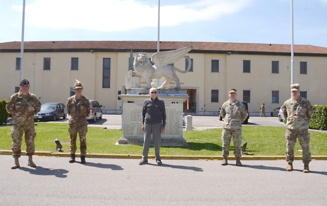 VICENZA, Italy (May 7, 2021) - From left to right: Italian Base Command Sgt. Maj. Ennio Zavagno, command sergeant major; Col. Michele Biasiutti, Senior Italian Officer and Deputy Chief of Staff of Southern European Task Force; Pietro Luigi Colombo; U.S. Army Garrison Italy Col. Daniel Vogel, commander, and Command Sgt. Major Scott Vetten, command sergeant major, pose for a picture May 7, 2021, after welcoming back Colombo who worked on Caserma Ederle in the early 1950’s.
Colombo’s visit, which was a special surprise for his 91st birthday, brought back fond memories of his military service and his time in Vicenza.