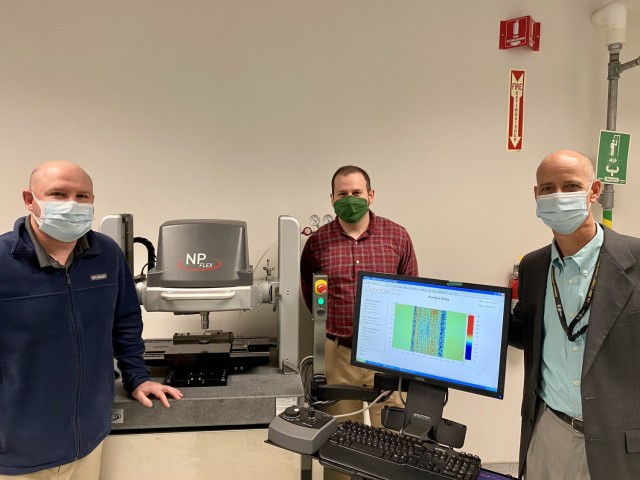 Researchers from the U.S. Army Combat Capabilities Development Command (DEVCOM) Ground Vehicle Systems Center (GVSC), from left, Allen Comfort, Steven Thrush, and James Dusenbury, are awarded the The Society of Tribologists and Lubrication...