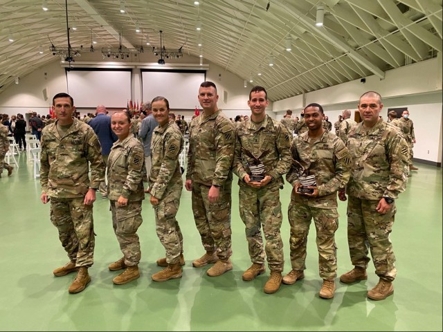 Lt. Col. Brian T. Looney(Middle), Command Sgt. Maj. Oscar Rodriguez (last on right), Master Sgt. Joushua Spaulding(first on left), 1st Lt. Trisha Burden (third from left), 1st Lt. Ralpael Eirea(third from right), 2nd Lt. Amanda Atkinson(second...
